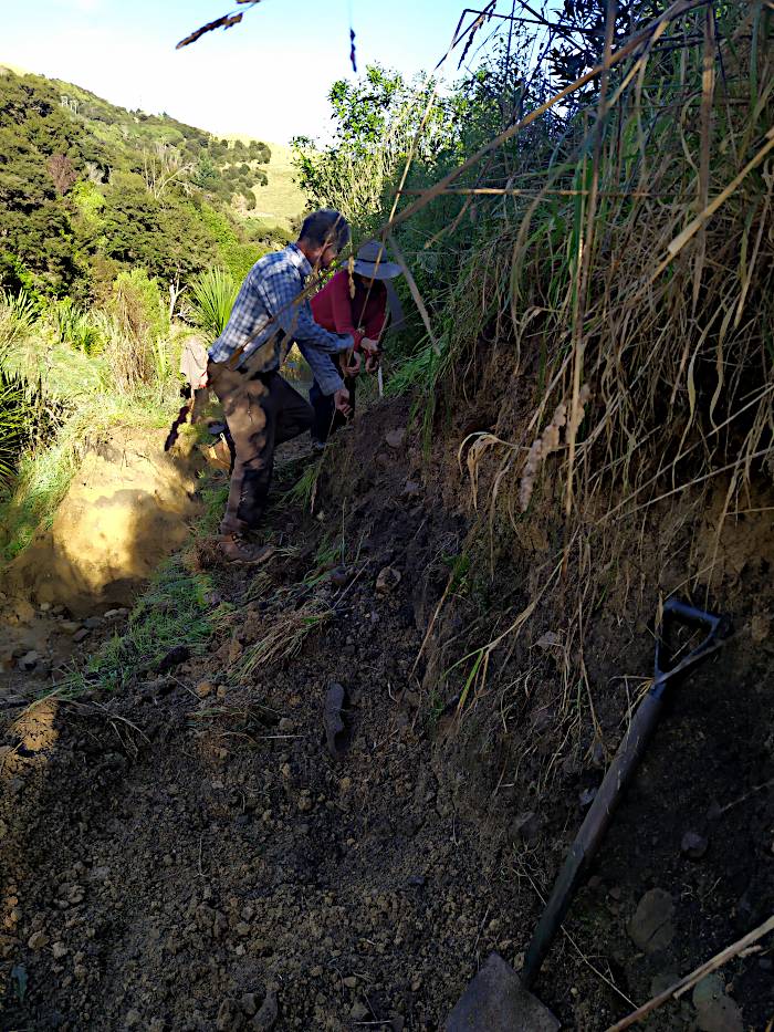 A picture of Ian and Lindy working on the track